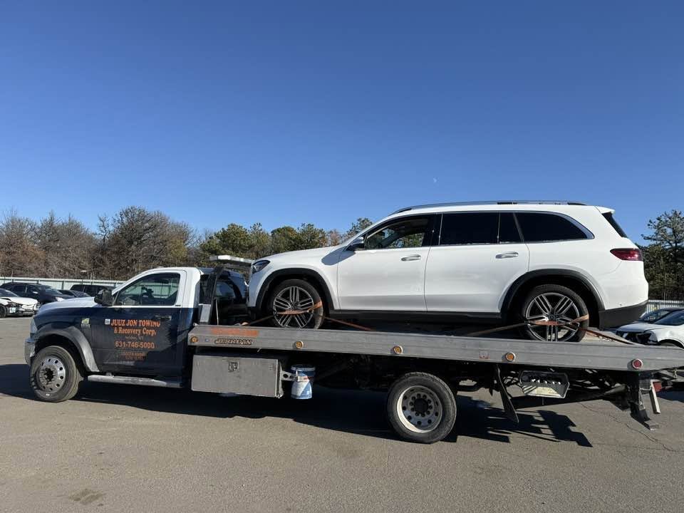 SUV Transport by Juuz Jon Towing Recovery Corp