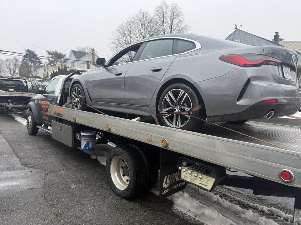 Sedan Towing by Juuz Jon Towing Recovery Corp