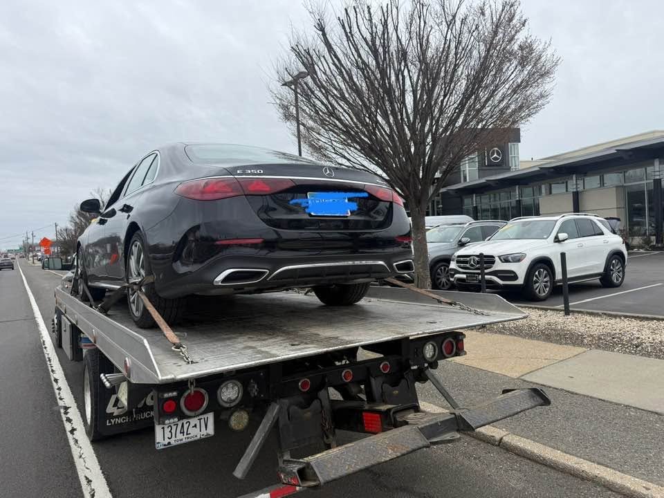 Luxury Sedan Transport by Juuz Jon Towing Recovery Corp